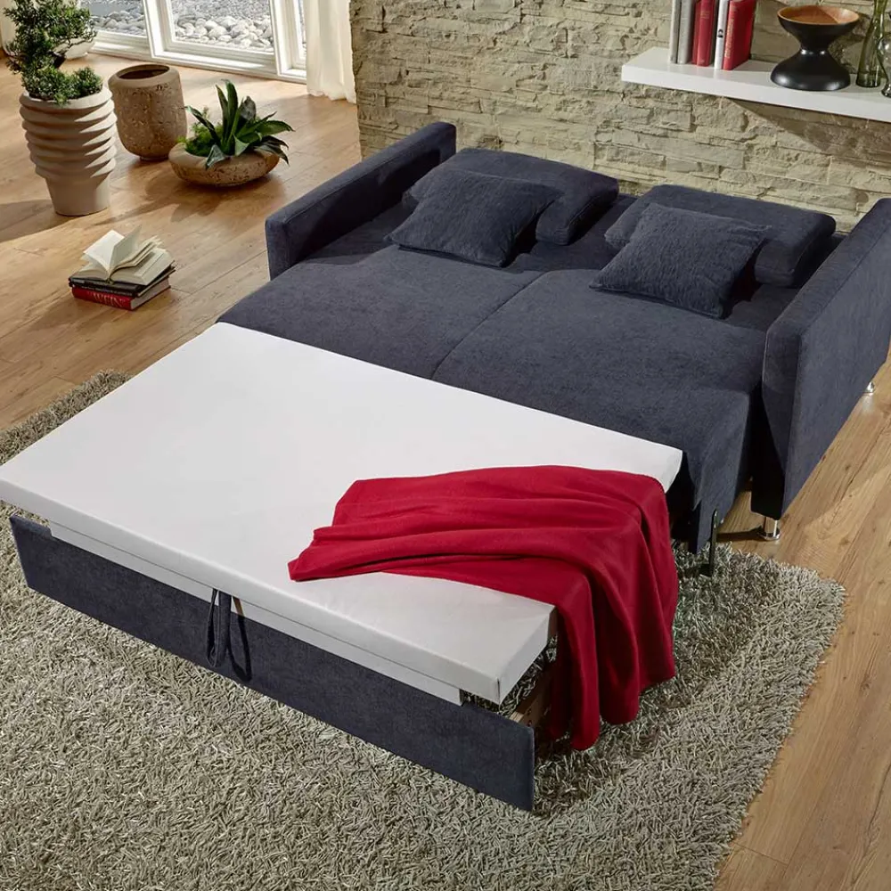 Wohnen Sofas<Couch mit Bettfunktion in Dunkelblau - Casbella