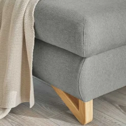 Wohnen Sofas<Eckcouch mit Schlaffunktion in Hellgrau - Baonga