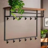 Wohnen Garderoben<Hängende Garderobe mit Ablage aus Nussbaum - Pilamonia