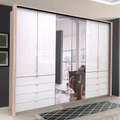 Wohnen Kleiderschränke<Luxus Kleiderschrank mit drei Gleittüren - Bosays