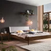 Wohnen Betten<Nussbaum Bett mit extravagantem Kopfteil - Astosa