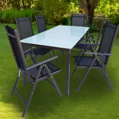 Wohnen Sitzgruppe<Tisch mit Klappstühlen für den Garten - Anlina (siebenteilig)